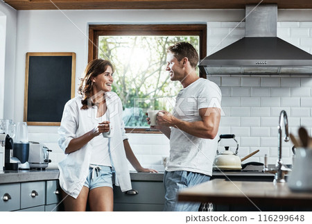Coffee, love and happy couple in kitchen for routine, care or romance together with relationship connection. Man, woman and people bonding in morning, marriage and support in home or modern house Coffee, love and happy couple in kitchen for routine, care or romance together with relationship connection. Man, woman and people bonding in morning, marriage and support in home or modern house 116299648