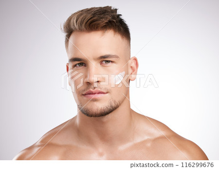 Skincare, portrait and man in studio with cream for moisturizer, grooming or morning routine on white background. Body, wellness and model with confidence for lotion, cosmetics or satisfaction 116299676