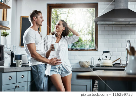 Coffee, love or happy couple in kitchen for morning, care or bonding together with an intimate connection. Man, woman and people embrace in home apartment for breakfast caffeine, relax or drink 116299733