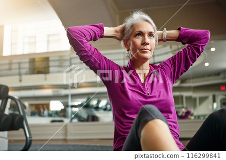 Mature woman, sit up and gym on floor with balance for strong core muscle with vision for wellness. Person, training and workout for abdomen, stomach and challenge for development at fitness club Mature woman, sit up and gym on floor with balance for strong core muscle with vision for wellness. Person, training and workout for abdomen, stomach and challenge for development at fitness club 116299841
