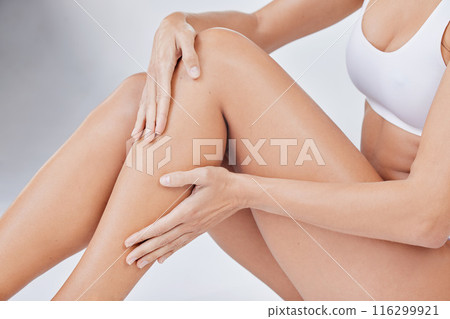 Woman, underwear and legs smooth for epilation, skincare and cosmetics in white studio background. Female person, wax or clean shave touching for health, wellness and hygiene or hair removal Woman, underwear and legs smooth for epilation, skincare and cosmetics in white studio background. Female person, wax or clean shave touching for health, wellness and hygiene or hair removal 116299921