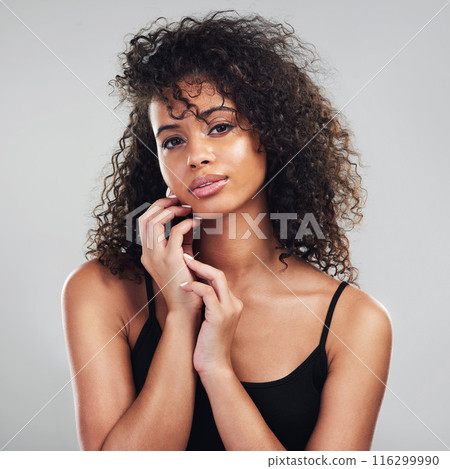Portrait, woman and hands in studio for skincare, beauty and cosmetic on white background. Curly hair, cosmetology and facial salon treatment for model person, natural and dermatology for skin health 116299990