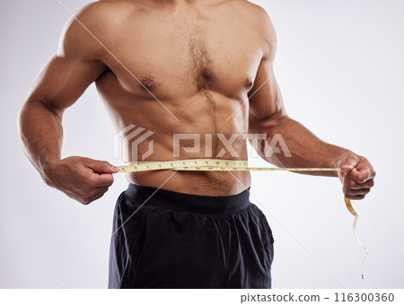 Fitness, man and measuring tape in studio white background for progress check, weight loss or body care. Male person, diet or fat tracking for wellness, health nutrition or exercise and workout Fitness, man and measuring tape in studio white background for progress check, weight loss or body care. Male person, diet or fat tracking for wellness, health nutrition or exercise and workout 116300360