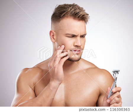 Doubt, man and razor for shaving face with wellness, skincare and ideas for hygiene in studio. Thinking, guy and product for hair removal and anxiety or stress for sensitive skin by white background Doubt, man and razor for shaving face with wellness, skincare and ideas for hygiene in studio. Thinking, guy and product for hair removal and anxiety or stress for sensitive skin by white background 116300363