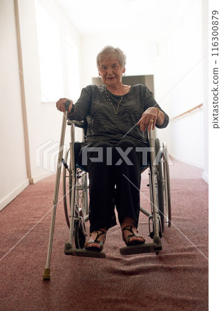 Portrait, wheelchair and senior woman in corridor with disability, retirement and smile in nursing home. Elderly person, walking stick or accessories in hallway for memories, physical therapy or care Portrait, wheelchair and senior woman in corridor with disability, retirement and smile in nursing home. Elderly person, walking stick or accessories in hallway for memories, physical therapy or care 116300879