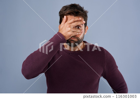 Shame, man and cover of eye, portrait and disappointed of fail of party in elections and headache. Blue background, palm and hand to hide face, embarrassed and sad student in politics and unhappy 116301003