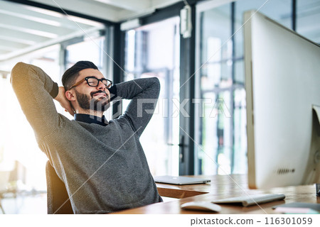 Businessman, stretching and relax at desk with computer, smile and break in office. Financial consultant, worker and rest with success in workplace for deadline, target and happiness for deal 116301059