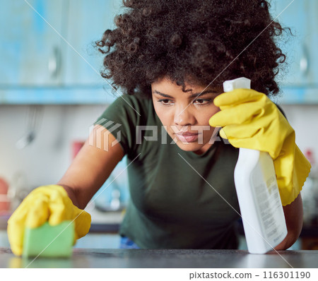 House, spray and woman with cleaning on table for housekeeping, maintenance and sanitation in kitchen. Person, bottle and detergent with gloves at home for bacteria, hygiene and removal of dirt House, spray and woman with cleaning on table for housekeeping, maintenance and sanitation in kitchen. Person, bottle and detergent with gloves at home for bacteria, hygiene and removal of dirt 116301190