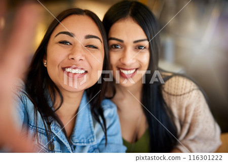 Women, friends and selfie in coffee shop together with portrait for social media and relationship. Profile picture, update and smile for vlog or blog in cafe with influencers for reunion in New York 116301222