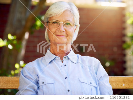 Woman, senior and smile portrait or outside relaxing, garden bench and happy for retirement or wellness. Nursing home, elderly female person and pensioner, fresh air and break in summer in park 116301281