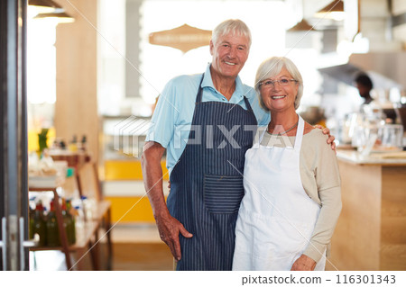 Senior, couple and portrait in restaurant business with smile, embrace and ready for hospitality service. People, barista and cafe owner or support in bakery with hug, confidence and store manager Senior, couple and portrait in restaurant business with smile, embrace and ready for hospitality service. People, barista and cafe owner or support in bakery with hug, confidence and store manager 116301343