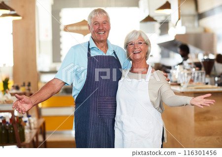 Senior, couple and portrait in cafe business with embrace, excited or ready for hospitality service. People, barista and coffee shop owner or welcome to bakery with hug, confidence and store manager Senior, couple and portrait in cafe business with embrace, excited or ready for hospitality service. People, barista and coffee shop owner or welcome to bakery with hug, confidence and store manager 116301456