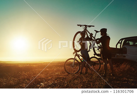 Sports, morning and people with bicycle in car for training, workout and exercise in countryside. Fitness, cycling and friends with mountain bike in trunk for outdoor adventure, travel and transport 116301706