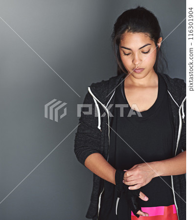 Gloves, woman and gym for fitness and mockup, boxing and wellness on gray background. Workout, strong or exercise for athlete person, body and cardio or sports training in studio for personal trainer Gloves, woman and gym for fitness and mockup, boxing and wellness on gray background. Workout, strong or exercise for athlete person, body and cardio or sports training in studio for personal trainer 116301904