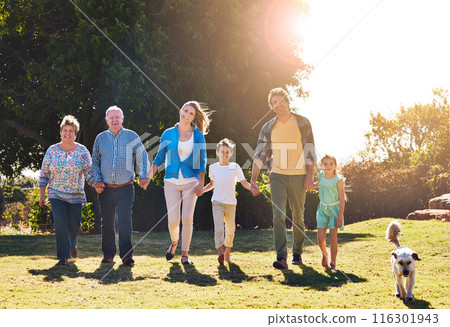 Portrait, generations and family with walking in park for love relationship, support together and holding hands. Happy couple, children and grandparents in nature for summer sunshine and vacation Portrait, generations and family with walking in park for love relationship, support together and holding hands. Happy couple, children and grandparents in nature for summer sunshine and vacation 116301943