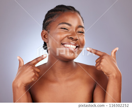 Portrait, black woman and dental hygiene for teeth in studio with cleaning, whitening and gum treatment. Smile, person and mouth for oral care, veneers or healthcare results on purple background Portrait, black woman and dental hygiene for teeth in studio with cleaning, whitening and gum treatment. Smile, person and mouth for oral care, veneers or healthcare results on purple background 116302252
