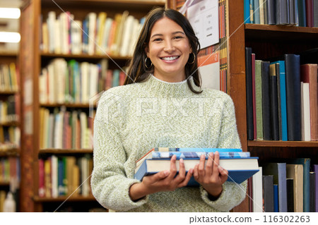 Woman, university student and books in library for portrait with smile for education, development or study at college. Girl, person and happy for research, course and excited for knowledge at campus Woman, university student and books in library for portrait with smile for education, development or study at college. Girl, person and happy for research, course and excited for knowledge at campus 116302263