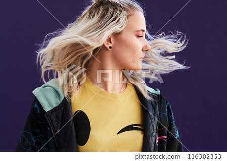 Girl, confident and hair shake in studio, beauty and cosmetics on purple background for haircare. Female person, fashion and color dye treatment for balayage, turn and texture for hairstyle or casual Girl, confident and hair shake in studio, beauty and cosmetics on purple background for haircare. Female person, fashion and color dye treatment for balayage, turn and texture for hairstyle or casual 116302353