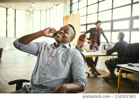 Businessman, phone call and smile with discussion in office for b2b negotiation, client networking and consulting. African employee, consultation chat and professional advice or advisory in workplace Businessman, phone call and smile with discussion in office for b2b negotiation, client networking and consulting. African employee, consultation chat and professional advice or advisory in workplace 116302363