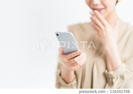 Female (parts) operating a smartphone 116302798