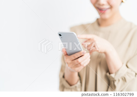 Female (parts) operating a smartphone 116302799