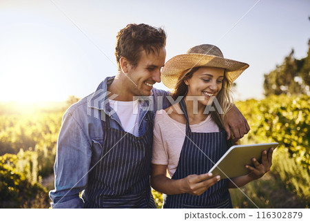 Tablet, farmer and happy couple in discussion for agriculture, sustainability or growth outdoor at field. Digital technology, man and woman at farm for planning food production, plant harvest or agro Tablet, farmer and happy couple in discussion for agriculture, sustainability or growth outdoor at field. Digital technology, man and woman at farm for planning food production, plant harvest or agro 116302879