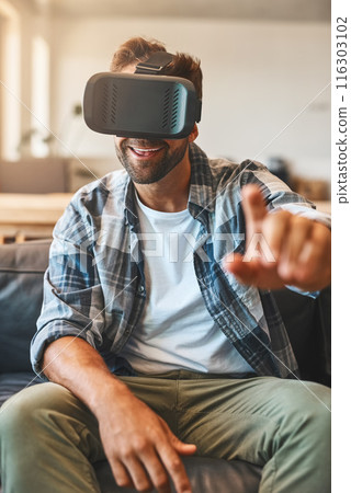Excited, man and virtual reality headset in home lounge of cyber experience, metaverse system or gaming connection. .Gamer, VR or games in living room with future, innovation and ui app technology 116303102