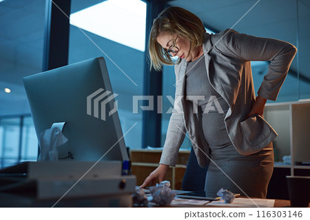 Business woman, back injury and night with pain for accident, strain or overworked at office. Frustrated female person, employee or sore spine in ache or muscle tension from working late at workplace 116303146