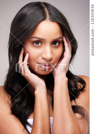 Woman, portrait and facial in studio for hair care, beauty and luxury salon treatment on white background. Girl, face and confidence with healthy texture, hairstyle and growth for wellness with glow 116303616