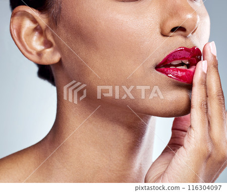 Makeup, mouth or girl in studio for red lipstick cosmetics, wellness and glowing skin treatment on grey background. Beauty, lips and model with gloss, shine and color, confidence or satisfaction Makeup, mouth or girl in studio for red lipstick cosmetics, wellness and glowing skin treatment on grey background. Beauty, lips and model with gloss, shine and color, confidence or satisfaction 116304097