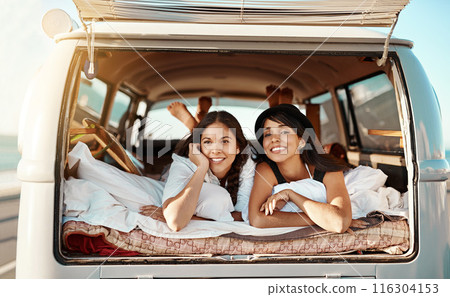 Travel, smile and portrait of women in van for road trip, summer holiday and vacation at countryside. Happy, relax and friends with blanket in vehicle for peace, adventure and journey in Croatia Travel, smile and portrait of women in van for road trip, summer holiday and vacation at countryside. Happy, relax and friends with blanket in vehicle for peace, adventure and journey in Croatia 116304153
