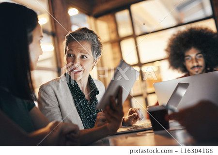 Night, tablet and boss in meeting with group, review and feedback for project, deadline and office. Teamwork, talking and people with tech, auditor and budget for business in corporate with research 116304188