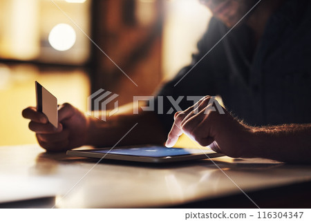 Hands, tablet and man with credit card for ecommerce in office for online shopping order at night. Banking, digital technology and male person with rent, debt or bills payment for startup company. 116304347