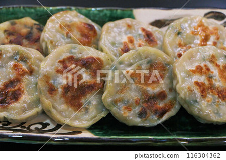 The grilled chive buns look delicious with just the right amount of browning. The grilled chive buns look delicious with just the right amount of browning. 116304362