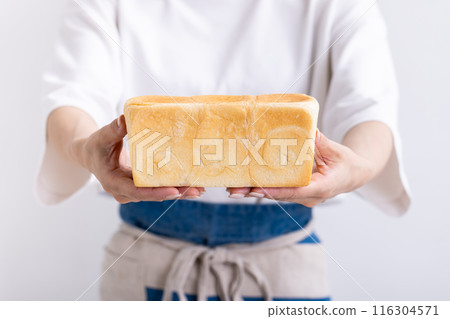 Woman holding bread Woman holding bread 116304571