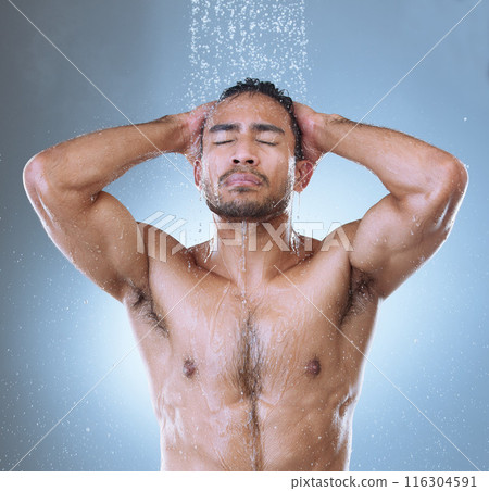 Shower, water and man in studio with hair care for hygiene, grooming or skincare on isolated background. Body, shampoo and Asian model for natural treatment, wellness or morning routine in bathroom Shower, water and man in studio with hair care for hygiene, grooming or skincare on isolated background. Body, shampoo and Asian model for natural treatment, wellness or morning routine in bathroom 116304591