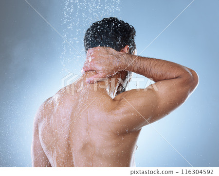 Shower, hygiene and man in studio with water splash for cleaning, grooming or shampoo on gray background. Back view, body and Asian model washing for natural treatment, wellness or morning routine Shower, hygiene and man in studio with water splash for cleaning, grooming or shampoo on gray background. Back view, body and Asian model washing for natural treatment, wellness or morning routine 116304592
