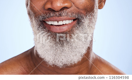 Smile, mouth and black man for oral hygiene and closeup, teeth and beard on blue background. Dentist, mature and face for male person in studio, dental care and cosmetic for healthy and fresh breath 116304598