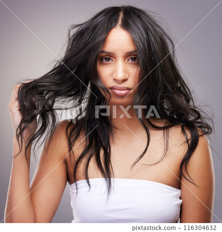 Woman, portrait and upset in studio for haircare, beauty and luxury salon treatment on white background. Girl, face and unhappy for hair loss, hairstyle and alopecia with stress, split ends or damage 116304632