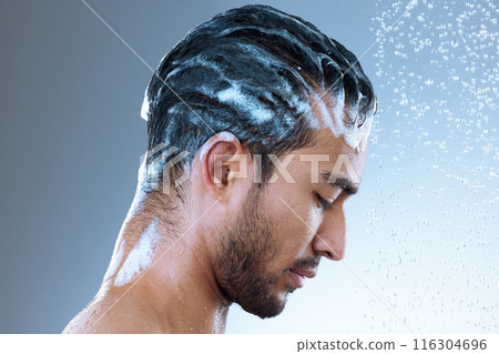 Studio, man and hair with shampoo, cleaning and routine of haircare, water drop and cosmetics for wellness. Gray background, grooming and cleaning of scalp, profile and person with soap and morning Studio, man and hair with shampoo, cleaning and routine of haircare, water drop and cosmetics for wellness. Gray background, grooming and cleaning of scalp, profile and person with soap and morning 116304696