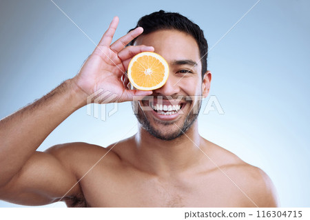 Skincare, portrait and man with orange for natural cosmetics, grooming or facial treatment on studio background. Body, wellness and Asian model with fruit for vitamin c, organic beauty or dermatology Skincare, portrait and man with orange for natural cosmetics, grooming or facial treatment on studio background. Body, wellness and Asian model with fruit for vitamin c, organic beauty or dermatology 116304715