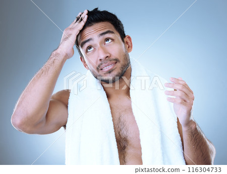 Man, thinking and haircare with towel for hygiene, skincare and grooming in blue background. Male person, clean and healthy for wellness, confidence and cosmetic with happiness in studio backdrop Man, thinking and haircare with towel for hygiene, skincare and grooming in blue background. Male person, clean and healthy for wellness, confidence and cosmetic with happiness in studio backdrop 116304733
