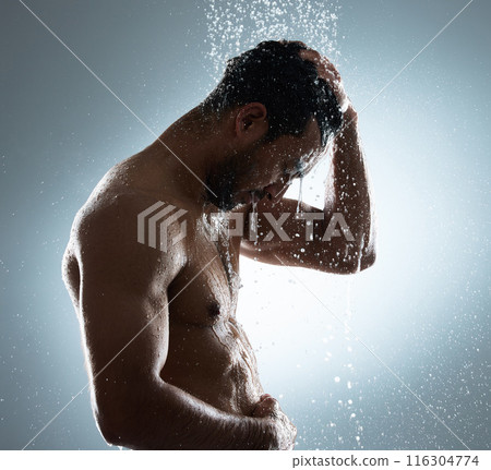 Man, shower and washing in studio for haircare, cosmetics and cleaning on gray background. Male person, profile and water drops for conditioner treatment or dermatology, grooming and hydration beauty 116304774