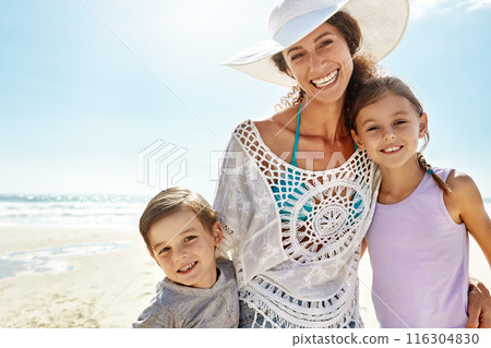 Portrait, hug or mother and kids at a beach for summer, fun and bonding in nature together. Happy family, face and woman with children at ocean for travel, journey and adventure on Miami vacation Portrait, hug or mother and kids at a beach for summer, fun and bonding in nature together. Happy family, face and woman with children at ocean for travel, journey and adventure on Miami vacation 116304830
