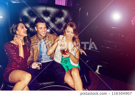 People, happy and friends in nightclub with cocktails, drinks or champagne for vip event, memory or reunion. Group, man or women in dark disco party couch for alcohol or social celebration to relax 116304907