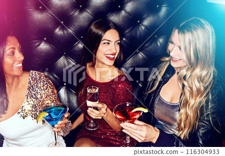Women, vip and friends in nightclub with drink, glass or cocktails for memory, event or reunion. Happy, relax and people in dark disco party couch for fashion, alcohol or social celebration in group Women, vip and friends in nightclub with drink, glass or cocktails for memory, event or reunion. Happy, relax and people in dark disco party couch for fashion, alcohol or social celebration in group 116304933