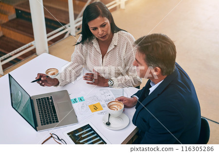 Laptop, documents and business people with meeting at desk for investment, budget or feedback. Top view, employees and tech with paperwork in office for financial report, solution or review of growth Laptop, documents and business people with meeting at desk for investment, budget or feedback. Top view, employees and tech with paperwork in office for financial report, solution or review of growth 116305286