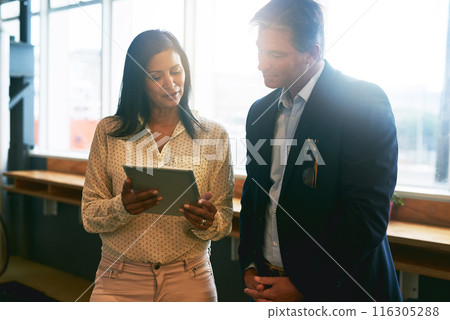Business, people and explain in office with tablet for teamwork, collaboration and discussion on company growth. Employee, accountant and conversation with feedback, report and financial statement Business, people and explain in office with tablet for teamwork, collaboration and discussion on company growth. Employee, accountant and conversation with feedback, report and financial statement 116305288