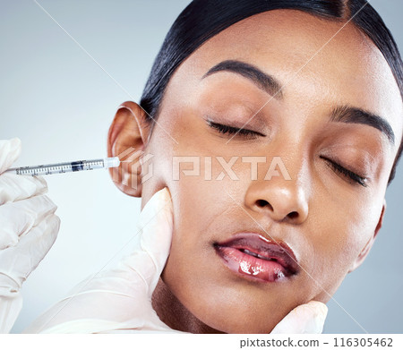 Woman, needle and hands, female model and injection in studio for filler for skin, skincare and collagen. Spa treatment, medical and cosmetics with face of person in white background for facial care 116305462
