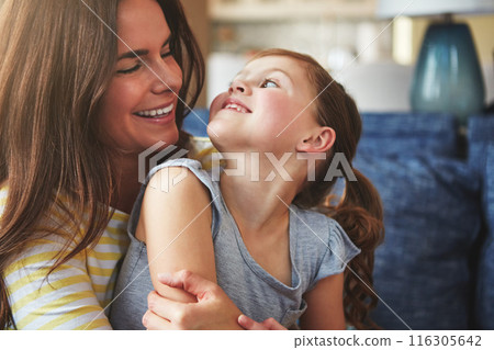 Woman, hug and child with love on sofa house for trust, bonding and support of relationship moment. Smile, mother and girl as family for care, security or relax with embrace on couch for childhood Woman, hug and child with love on sofa house for trust, bonding and support of relationship moment. Smile, mother and girl as family for care, security or relax with embrace on couch for childhood 116305642